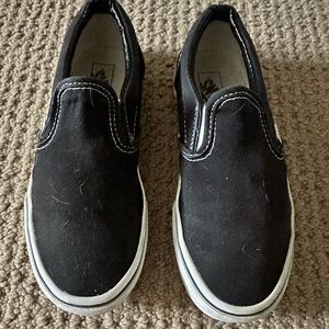 Vans Black and White Slip-On Sneakers